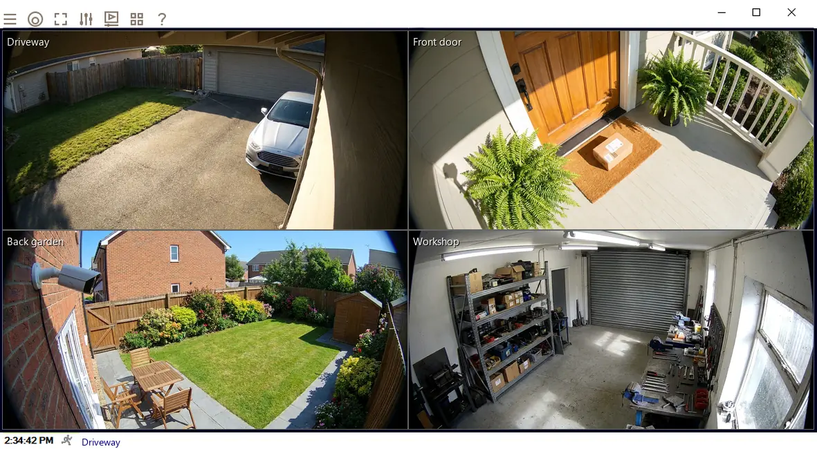 The VISEC window on Windows showing four cameras at once: driveway, front door, back garden and workshop